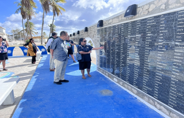 Paying respects at the War Memorial in Nauru.